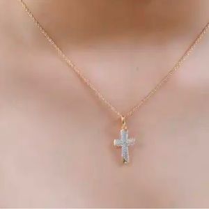 Diamond Accent Cross Pendant.